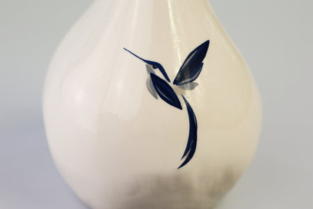 White drop urn with delphinium blue hummingbird Beige