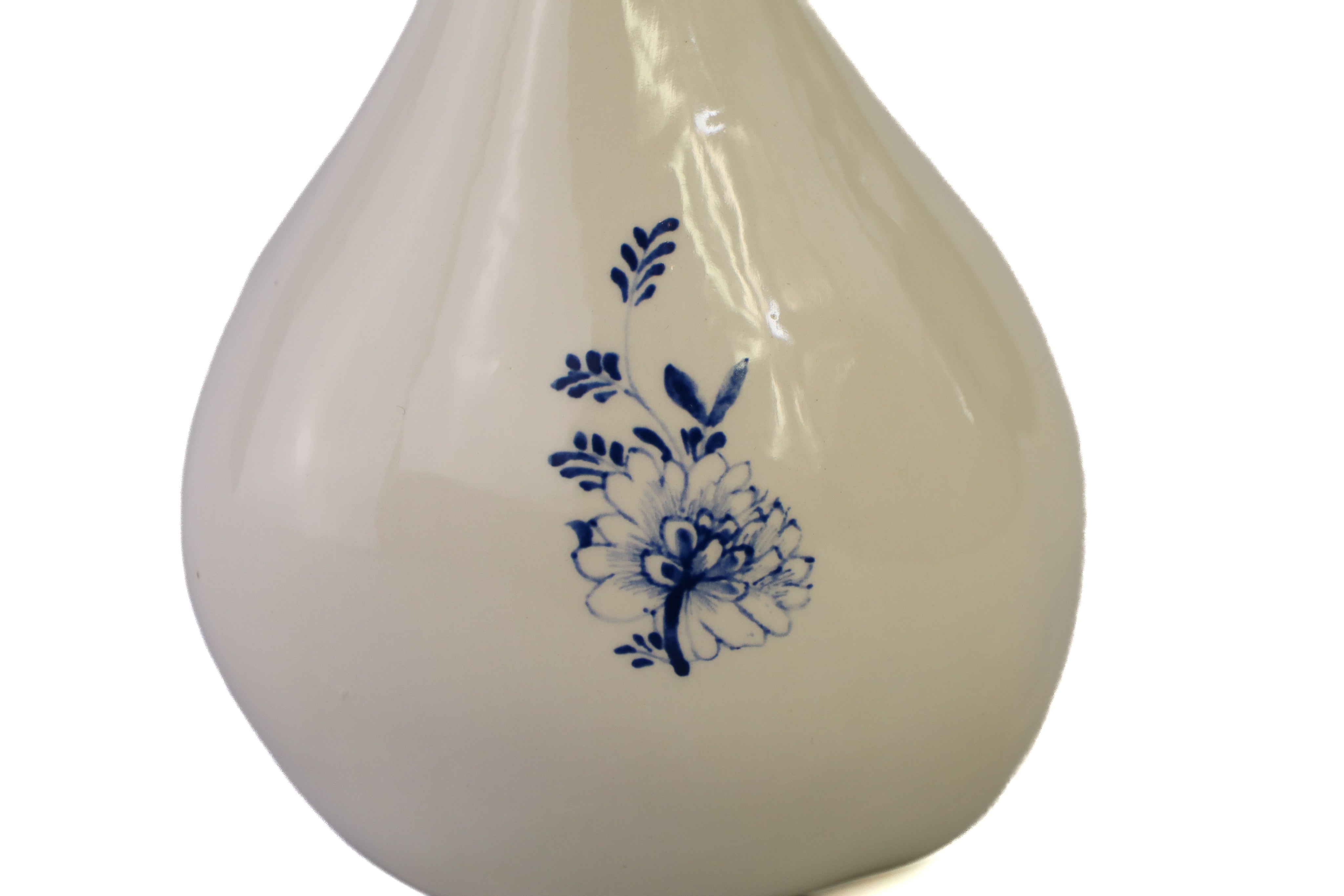 White drop urn with delphinium blue flower Beige